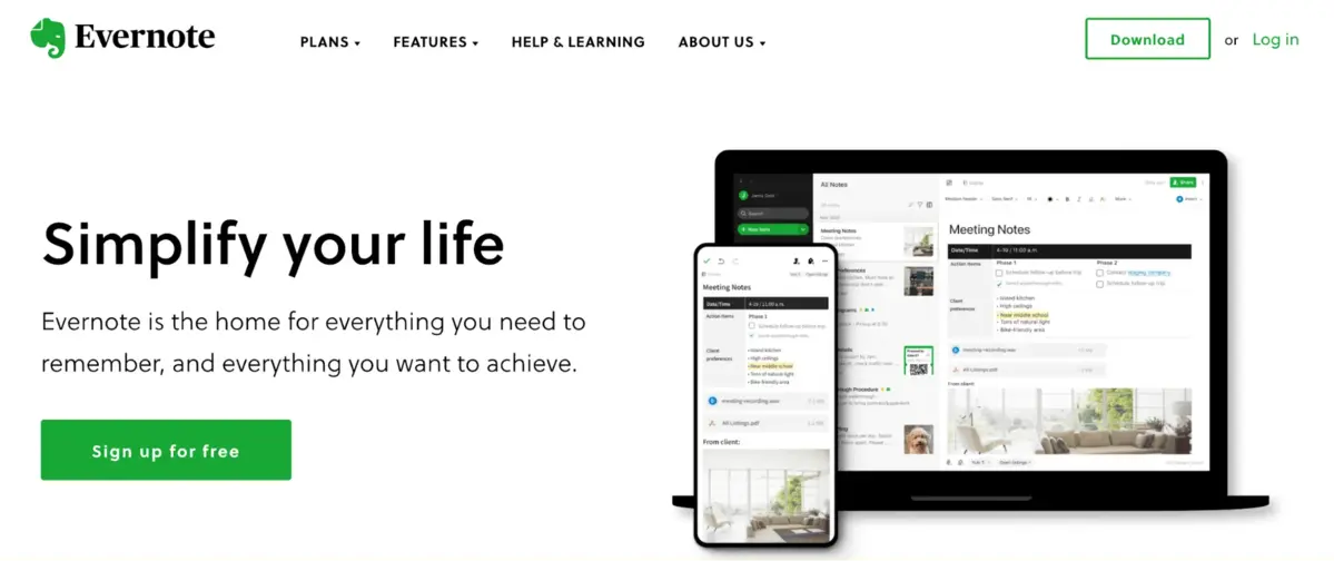 Evernote homepage with the headline 'Simplify your life.' Below, the text states, 'Evernote is the home for everything you need to remember, and everything you want to achieve.' There is a green button labeled 'Sign up for free.' On the right side, there is an image of a laptop and a smartphone both displaying the Evernote application with meeting notes and other organizational tools. The top navigation includes links to Plans, Features, Help & Learning, and About Us, along with options to Download or Log in.