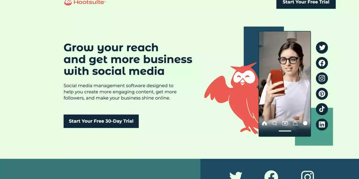 Homepage banner of Hootsuite featuring the text 'Grow your reach and get more business with social media' in large, bold letters. Below the main text is a description of the social media management software and a call-to-action button that says 'Start Your Free 30-Day Trial.' To the right, there is an illustration of a red owl and an image of a woman with glasses looking at her phone. Social media icons are listed vertically next to the image, including Twitter, Facebook, Instagram, Pinterest, TikTok, and LinkedIn.
