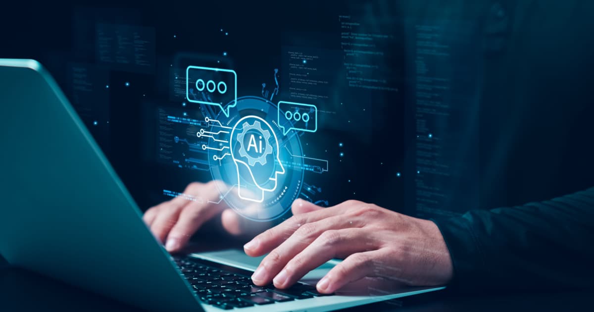 A person typing on a laptop with a digital overlay of an AI icon and various technology-related icons and text. The overlay includes a graphic of a human head with gears and the letters 'AI' inside, along with speech bubbles and data processing visuals, representing the integration of artificial intelligence in content creation and technology.