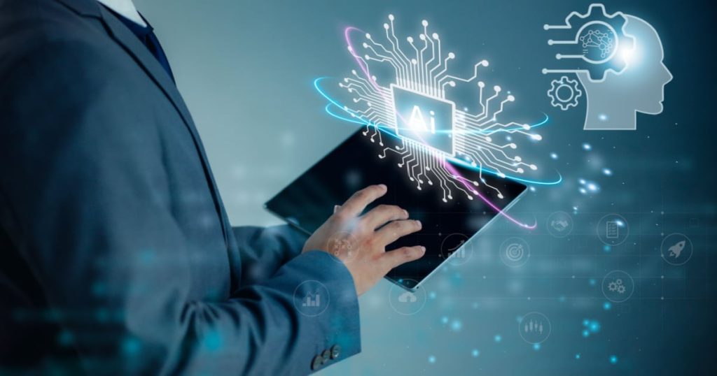Person using a tablet with a digital representation of AI technology and brain icons.
