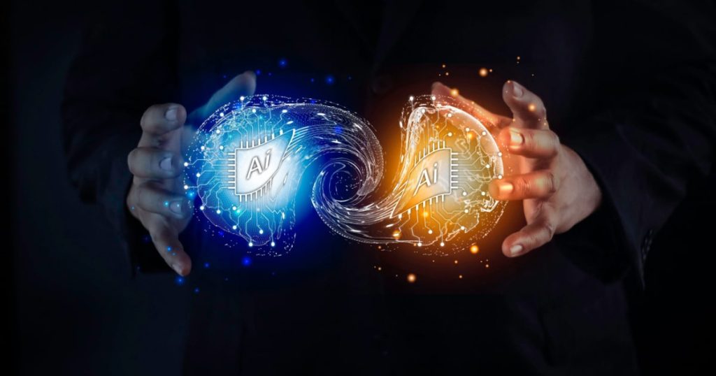 A person in a dark suit is holding two glowing, interconnected orbs with the letters 'AI' on them. The orb on the left is blue with digital circuitry, and the orb on the right is orange with similar circuitry. The two orbs are connected by a swirling stream of light and digital particles, symbolizing the connection and flow of artificial intelligence.